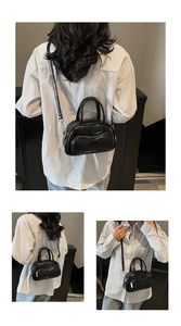 Detailed views of a black glossy mini bowling bag with silver zipper and shoulder strap