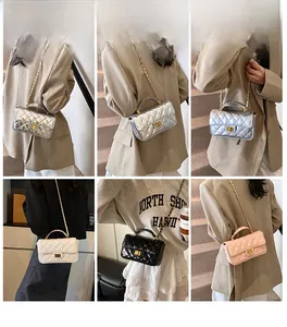 Close-up of quilted patent leather crossbody bags with metal chain straps and twist locks