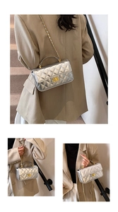 Detailed views of silver quilted chain crossbody bag with golden handle and lock