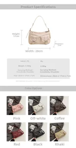 Detail view of a cool girl style PU underarm bag with silver rivets and multi-pocket design