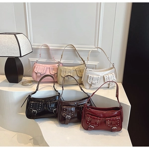 Detailed multi-color display of Y2K style faux leather shoulder bags with metal rivets