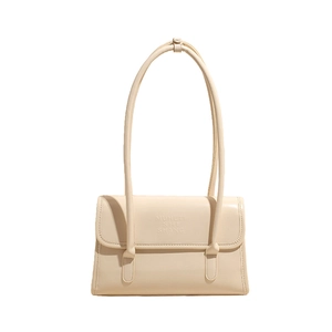 Chic beige baguette shoulder bag with slim double straps and embossed logo on white background