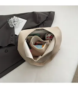 Top view showing large capacity and internal storage of the lychee leather tote bag