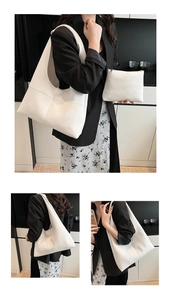 Detailed view of white lychee grain tote bag with matching zippered inner pouch