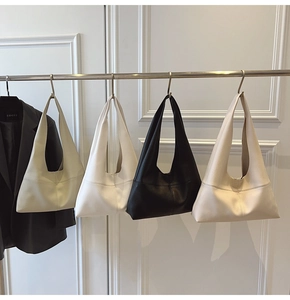 Minimalist soft leather tote bags shown in beige, white, black, and khaki colors