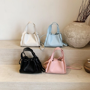 Litchi pattern bucket bags in four colors with ruffled edges and detachable straps