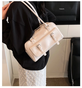 Patent leather shoulder bag, stylish underarm pillow bag with front buckle pockets.
