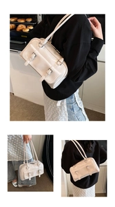 White oil-wax leather shoulder bag, trendy underarm pillow bag with double buckle front details.