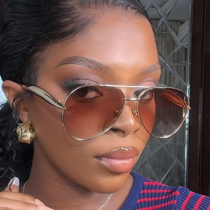 Oversized gold metal aviator sunglasses with brown gradient lenses for outdoor driving