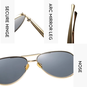 Detail view of reinforced hinges and curved metal temples on pilot sunglasses