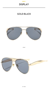 Front and 45-degree side view of oversized gold aviator sunglasses with black lenses
