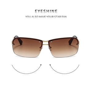 Detail view of Y2K rimless sunglasses with brown gradient lenses and gold metal bridge