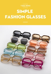 Detailed flat lay of geometric hexagonal sunglasses in multiple trendy candy colors