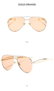 Detail view of gold metal aviator sunglasses with orange lenses showing front and side profile