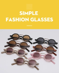 Retro small round sunglasses in seven assorted colors with thick frames and metal bridge