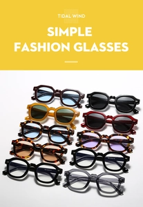 Detailansicht der polygonalen Sonnenbrille mit klobigem Rahmen in Schwarz und Amber