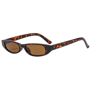 Retro vintage oval tortoiseshell sunglasses with brown lenses in a 45-degree side view