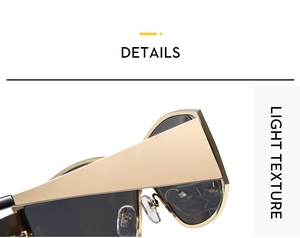 Detailed close-up of wide golden metal temples on stylish rimless cycling sunglasses