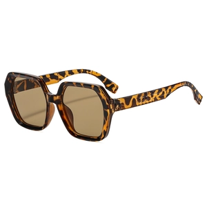 Fashionable oversized square tortoise shell sunglasses with amber lenses and side detail