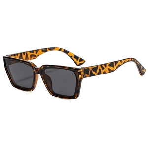 Classic square tortoise shell sunglasses with dark grey lenses in a minimalist style