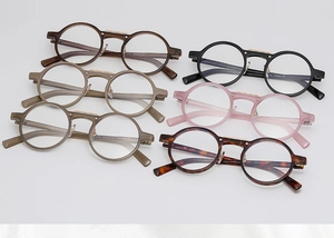 Detailed macro view of the round retro frame sunglasses showing model 3167 parameters