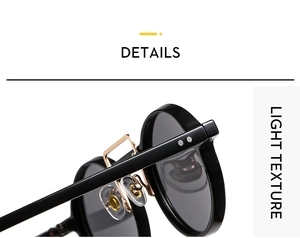 Detail view showing sturdy hinges and gold rivets on retro round frame sunglasses