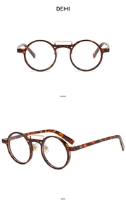 Detail view of round demi tortoise sunglasses with a metal bridge and rivet accents