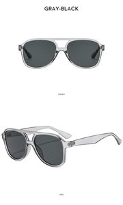 Front and side views of transparent gray pilot sunglasses with double-bridge frame