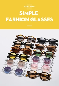 Close-up of retro round frame sunglasses in multiple colors and tinted lenses