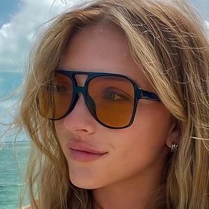 Classic black frame aviator sunglasses with orange lenses for outdoor sun protection