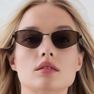 Fashionable geometric metal cat eye sunglasses on model for stylish UV protection