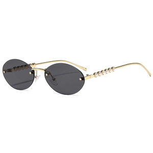 Chic lunettes de soleil ovales sans monture dorée avec branches ornées de perles