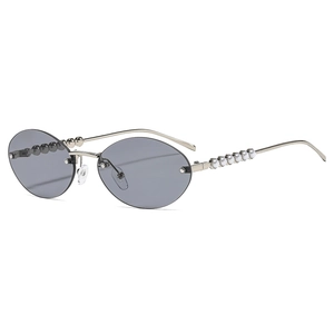 Lunettes de soleil ovales sans monture avec monture argentée et branches perlées