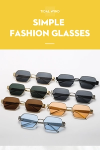 Close-up of seven assorted colorful hexagonal metal sunglasses with polarized lenses