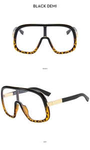 Oversized black and demi-shell sunglasses frames with gold metal temples, front and side views