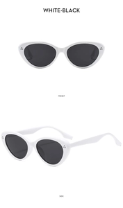 Detailansicht der weißen Katzenaugen-Sonnenbrille mit schwarzen Gläsern und Nieten