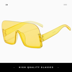 Détail macro de lunettes de soleil carrées jaunes sans monture avec rivets argentés