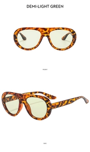 Détail de lunettes de soleil ovales écaillées avec verres vert clair, vues de face et côté