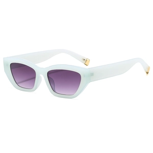 Retro cat-eye sunglasses with translucent matte blue frames and purple gradient lenses