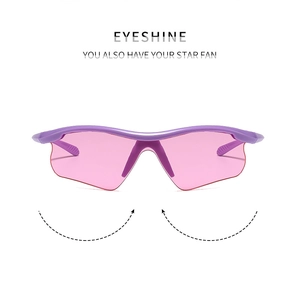Detail of purple streamlined frame and transparent pink lenses for sports sunglasses