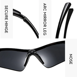 Detail view of reinforced metal hinges and curved anti-slip temples on silver ski goggles