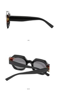 Side and back view of black polygon sunglasses with amber tortoiseshell details