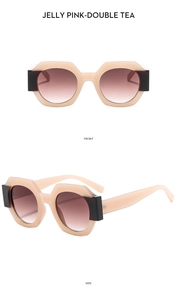 Detailed front and side view of geometric polygon sunglasses in jelly pink finish