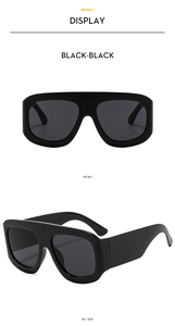 Quadratische Oversize-Sonnenbrille mit flacher Oberseite in Front- und Seitenansicht