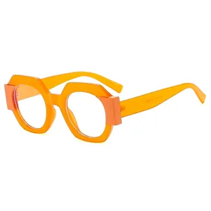 Fashionable bright orange hexagonal frame glasses with a vintage thick geometric design