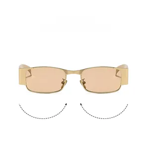 Detailed macro view of square metal frames with trendy light orange tinted lenses