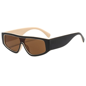 Lunettes de soleil rétro surdimensionnées avec monture noir et beige et verres marron à 45°