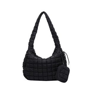 Minimalist black quilted cloud tote bag with matching detachable round coin purse