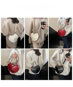 Detailed views of heart-shaped crossbody bag in white, red and black showing styling