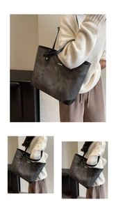 Dettaglio ravvicinato della borsa shopper grigio scuro con texture vintage e borchie